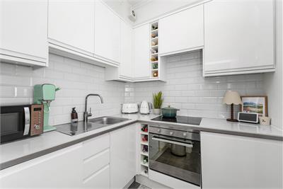 13/12 Caledonian Place, Edinburgh, EH11 2AW - image 4
