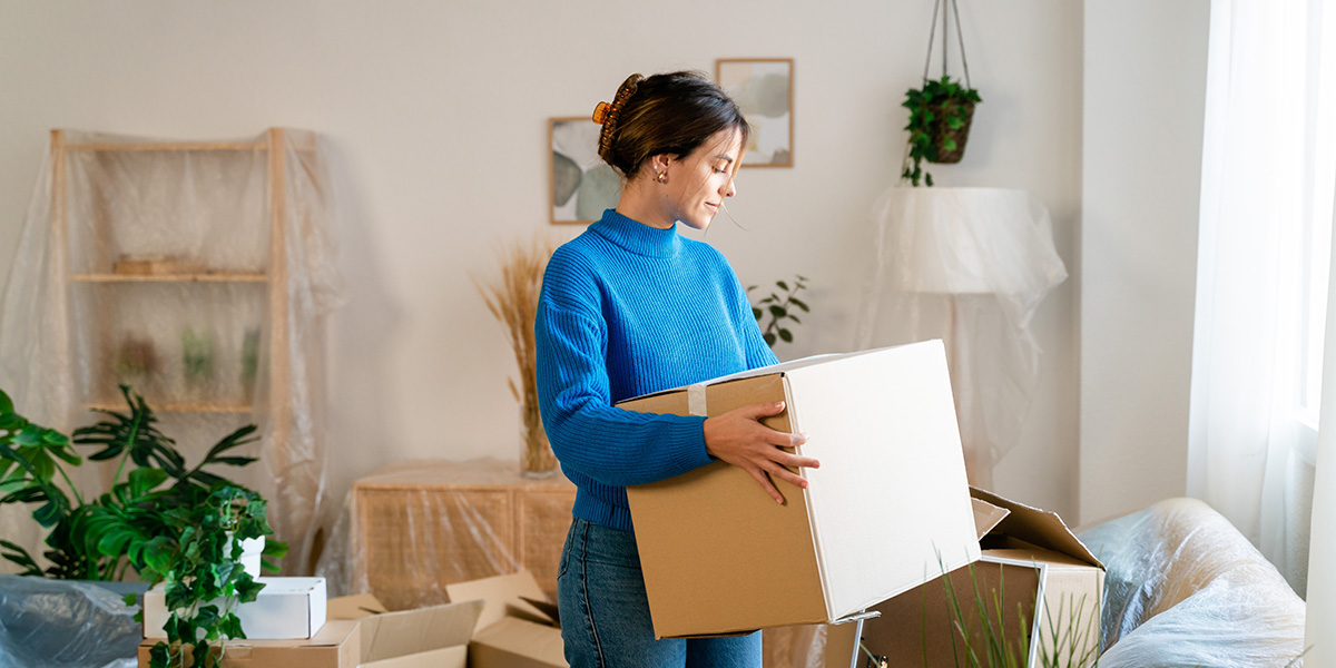 Woman moving home