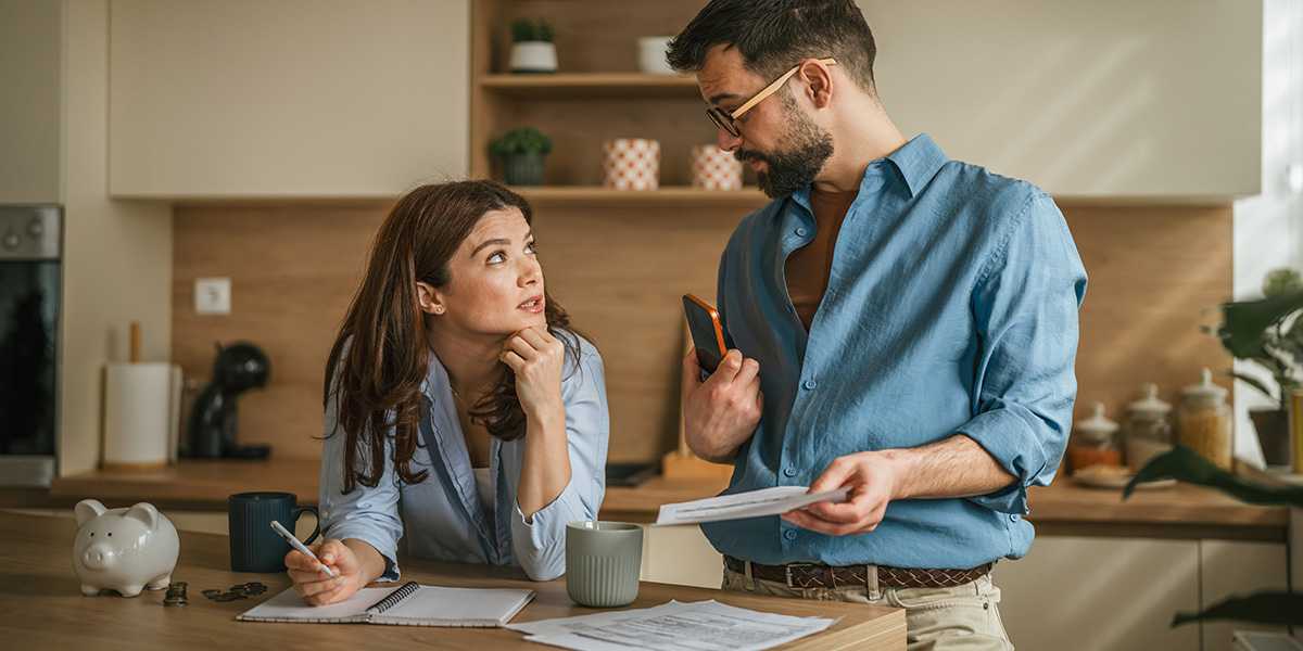Couple looking at mortgage information